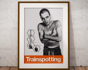 May include: Framed black and white poster featuring a man with arms crossed, wearing a t-shirt. The poster includes the word "Trainspotting" in orange text at the bottom. Additional images are in hexagonal shapes.