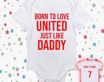 May include: White baby bodysuit with red text that reads "BORN TO LOVE UNITED JUST LIKE DADDY." A smaller bodysuit shows "BABY'S NAME" and the number 7 in red. The background has a pattern of colorful stars.
