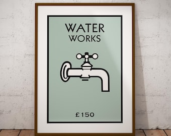 May include: Framed print featuring the words "WATER WORKS" above a black and white illustration of a faucet. The text "£150" is below the faucet illustration. The print is in a brown frame.