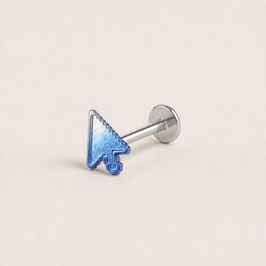 May include: A silver-toned labret stud body jewelry piece featuring a blue computer mouse cursor icon as the decorative top. The piece includes a straight post and a flat circular backing disc, designed for various body piercings.