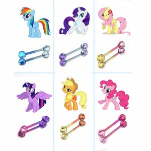 May include: An assortment of cartoon pony characters and barbell tongue rings. The ponies are in various colors, including blue, purple, yellow, and pink. The tongue rings have clear, colored, and iridescent ball ends.