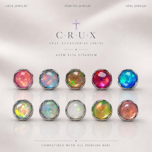 May include: Ten round cabochon opal studs set in ASTM F136 titanium, arranged in two rows. The text reads CRUX JEWELRY, PIERCING JEWELRY, OPAL JEWELRY, C+R+U+X, OPAL ACCESSORIES SERIES, ASTM F136 TITANIUM, and COMPATIBLE WITH ALL PIERCING BARS.