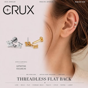 Puede incluir: Un pendiente de piercing con parte posterior plana sin rosca, con dos dijes en forma de flor conectados y piedras transparentes. Disponible en tonos plata y oro, incluye un poste a presión. El texto incluye CRUX JEWELRY, ASTM F136 TITANIUM y THREADLESS FLAT BACK.