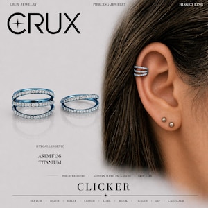 May include: A blue titanium hinged clicker ring featuring three rows of clear stones. The jewellery is labelled as ASTM F136 titanium and hypoallergenic. The image displays the ring worn in the upper ear cartilage alongside two small stud earrings.