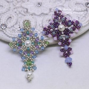 Chrisia pendants in two colors. One is in silver, green peridot and light blue. The other is in purple, blue, pink and pacific opal.