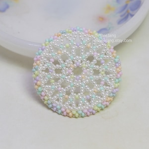 Olwyn wheel pendant in white and mix pastel.