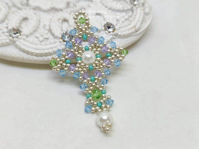 Chrisia pendants in silver, green peridot and light blue.