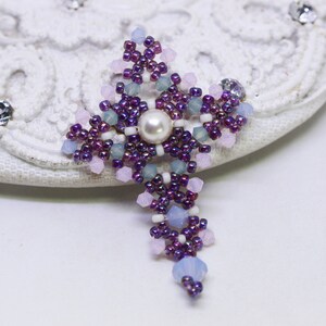 Chrisia pendants in purple, blue, pink and pacific opal.