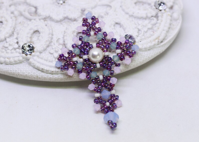 Chrisia pendants in purple, blue, pink and pacific opal.