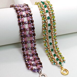 Two wide, handcrafted beaded cuff bracelets are draped over a white cylinder, showcasing an intricate Right Angle Weave lattice design. Each piece is meticulously woven with faceted bicone crystals, round pearls, and seed beads, secured with a metallic toggle clasp.

    Left: Purple and lavender faceted beads accented by dark metallic bronze rounds and a silver clasp.
    Right: Emerald and olive green bicones with gold-toned pearls and a gold clasp.