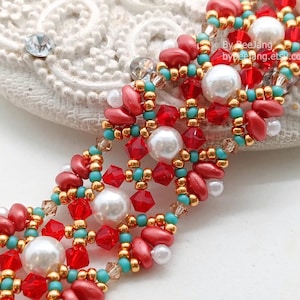 May include: A detailed beaded bracelet in red, white, gold, and turquoise. The intricate design incorporates various bead shapes and sizes. The text "By BeeJang, bypeejang.etsy.com" is visible on the image.