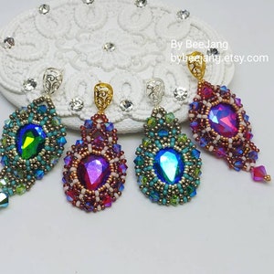 May include: Four pairs of iridescent beaded earrings with a teardrop-shaped crystal in the centre. The earrings are in shades of teal, green, purple, and red.