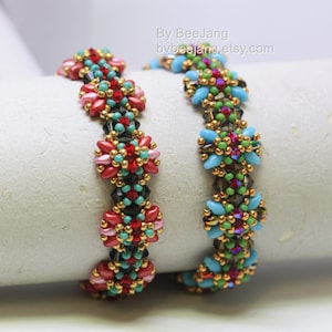 May include: Two beaded bracelets with floral designs. One bracelet features red, pink, and black beads with gold accents. The other bracelet has blue, green, and purple beads with gold accents. The bracelets are displayed on a white surface.