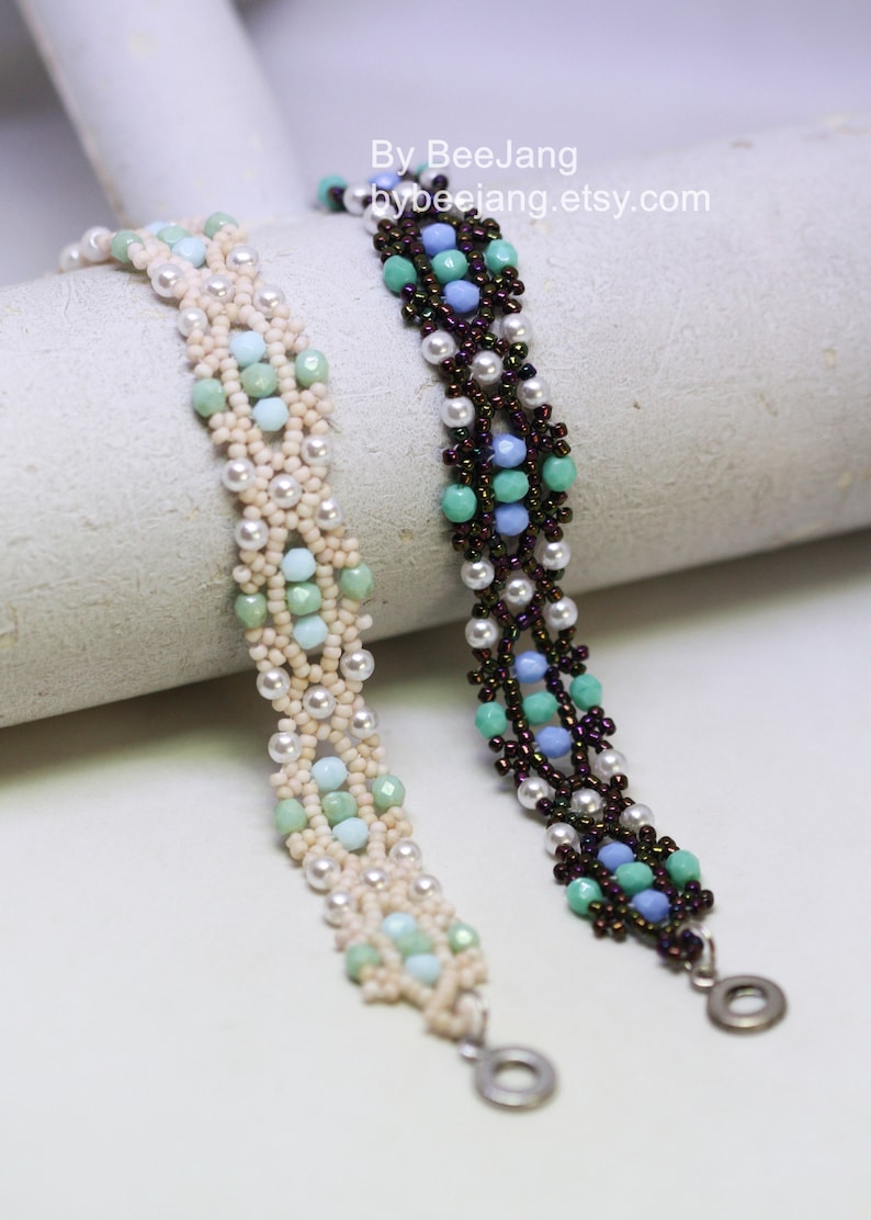 May include: Two beaded bracelets with a white and green design and a brown and blue design. The bracelets have silver clasps. By BeeJang bybeejang.etsy.com
