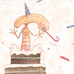 May include: A cartoon alien wearing a purple and blue party hat is jumping out of a chocolate cake with white frosting. The alien has a long, thin tongue sticking out and is holding a party horn. There are red and blue candles and confetti in the background.