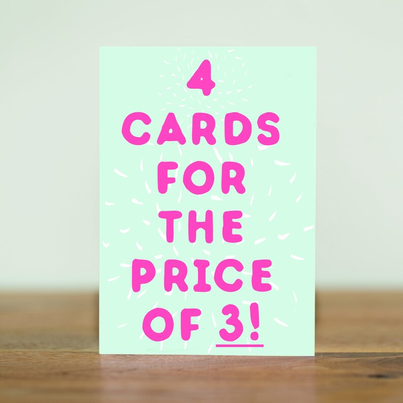 May include: A light blue card with white and pink text that reads "4 CARDS FOR THE PRICE OF 3!"