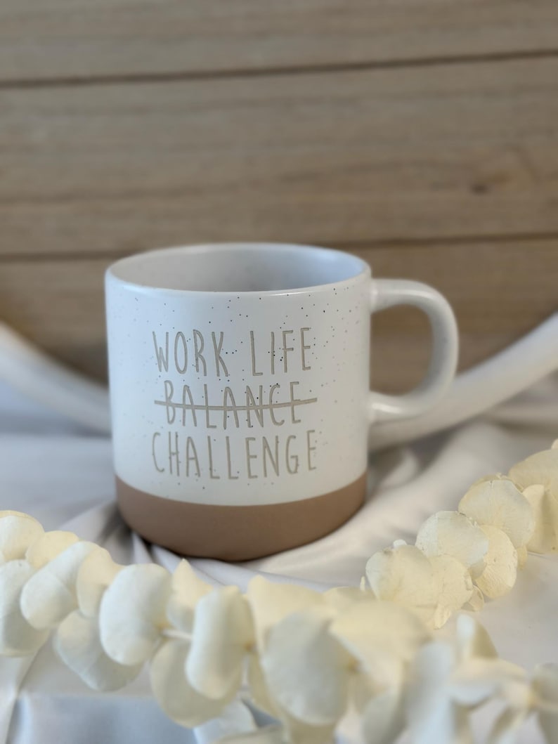 May include: A set of three ceramic mugs with a speckled, matte finish. The mugs are in shades of cream, light gray, and dark gray. Each mug has a simple, minimalist design, perfect for coffee or tea.