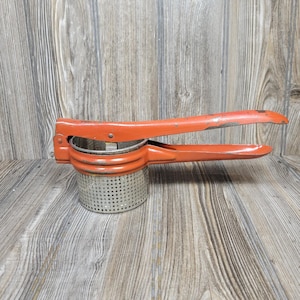 Vintage Red Handle Potato Ricer Lefse Utensil, Handy Things USA, Metal Masher