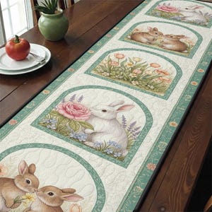 May include: Easter table runner with quilted panels depicting bunnies and flowers within arched frames. The runner has a pale green border with floral details. Each panel presents a unique bunny scene with flowers, creating a charming spring theme.