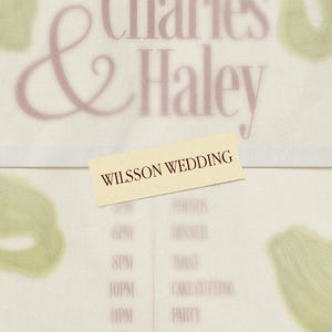 May include: A wedding invitation with the names "Charles & Haley" in a soft pink script. The invitation includes a schedule with times and events, and the date 07.08.2026. The words "WILSSON WEDDING" are also present.