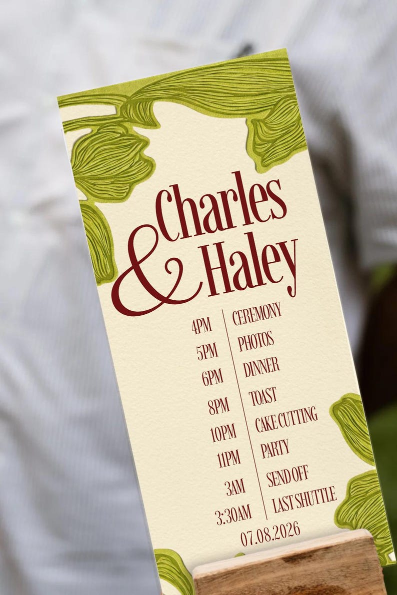 May include: A wedding itinerary card with the names "Charles & Haley" in burgundy script. The card lists the ceremony schedule, including times for the ceremony, photos, dinner, toast, cake cutting, party, send off, and last shuttle. Green floral design.
