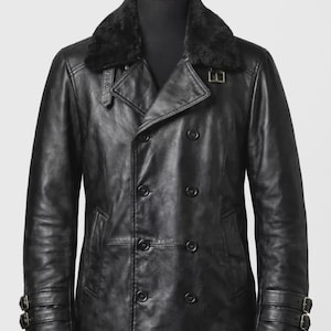 May include: Black leather jacket with a faux fur collar. The double-breasted coat features multiple buttons, a notched lapel, and buckle details on the sleeves. The jacket is displayed on a mannequin.