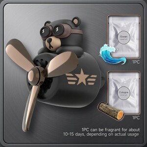 Airplane car air freshener with rotating propeller and pilot bear design, designed as a vent clip diffuser for car interiors. This decorative car accessory provides light fragrance while adding a fun aviation-inspired touch. Made from durable ABS material, it easily attaches to air vents and spins with airflow. Perfect for enhancing car decor and keeping your vehicle fresh during daily drives or road trips.