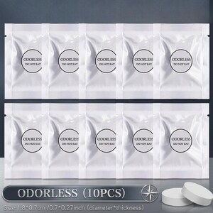 May include: Ten white, sealed packets with the word "ODORLESS" and "DO NOT EAT" printed on them. The packets are arranged in two rows of five. Below, the text "ODORLESS (10PCS)" is displayed. Two white tablets are visible at the bottom right.