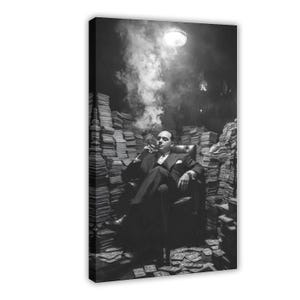 May include: Black and white canvas print depicting a man in a suit seated in a leather chair, smoking a cigar. He is surrounded by stacks of money and smoke. The image is lit by a single overhead light.