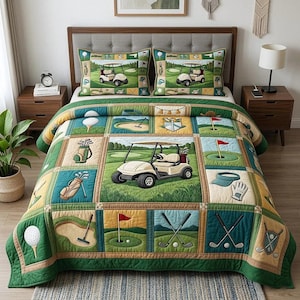 May include: A golf-themed quilt set featuring a patchwork design with golf course elements. The quilt showcases squares with golf carts, golf balls, flags, and golf bags in shades of green, beige, and brown. Includes two matching pillow shams.