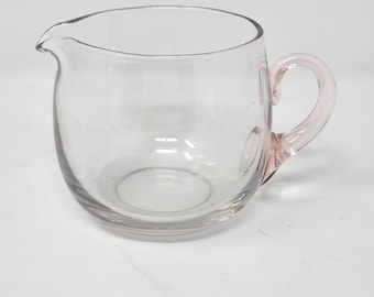 Cremeira vintage de vidro transparente com alça rosa claro