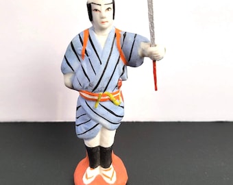 Hakata Samurai with sword, detailed vintage clay art