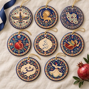 May include: Eight circular ceramic ornaments featuring intricate blue, red, and gold floral borders. Designs include a Faravahar, a lion with a sword, a map of Iran, a pomegranate, Persian calligraphy reading Woman Life Freedom, an angel, the word Love, and a whirling dervish.