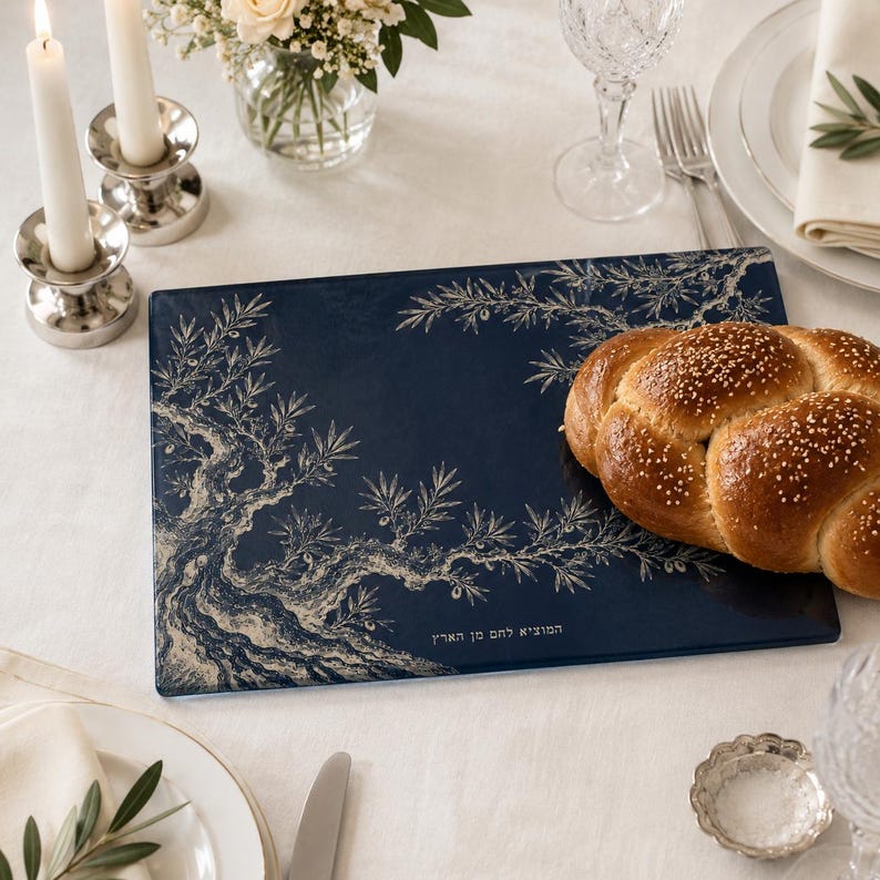 Matching olive tree Toile de Jouy challah cover and tempered glass challah board with Hebrew Shabbat text, available individually or as a set in Bordeaux Burgundy, Espresso Brown, Heritage Olive and French Navy.