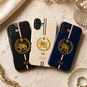 May include: Three phone cases with the Iranian emblem. One case is black, one is cream, and one is navy blue. Each case features a gold lion and crown design, with vertical stripes of red, white, and green. The word "Iran" is written in Farsi.