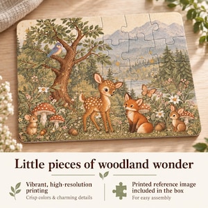 May include: A rectangular jigsaw puzzle featuring a woodland scene with a fawn, a fox, a rabbit, and a mouse among trees, mushrooms, and flowers. The text below reads: Little pieces of woodland wonder, Vibrant, high-resolution printing, Crisp colors & charming details, Printed reference image included in the box For easy assembly.