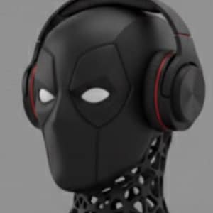 Könnte beinhalten: Ein schwarzer Kopfhörerständer in Form einer Deadpool-Maske mit weißen Augenausschnitten und roten Akzenten an den Kopfhörern. Der Ständer hat einen detaillierten, durchbrochenen Sockel, und die Kopfhörer sind schwarz.