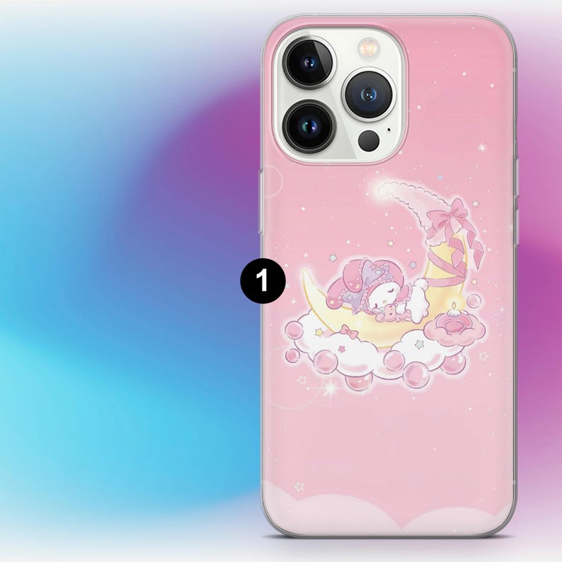 May include: Pink phone case featuring a cartoon illustration of a sleeping bunny on a crescent moon and cloud. The design includes stars and a pink background. The case has a camera cutout and buttons.