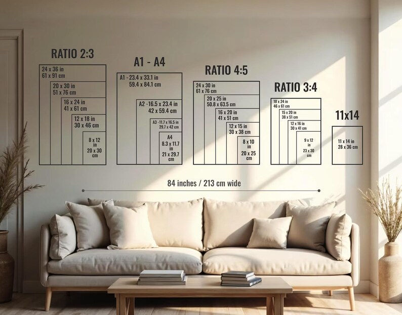 May include: A wall display showing print size ratios and dimensions in inches and centimeters. The ratios include 2:3, A1-A4, 4:5, 3:4, and 11x14. The display is above a beige sofa with pillows and a wooden coffee table.