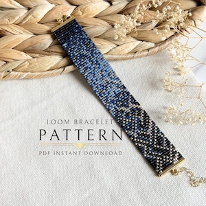 May include: A beaded loom bracelet with a gradient design in shades of blue, black, and white. The bracelet is rectangular with gold-colored end caps and a chain clasp. The text "LOOM BRACELET PATTERN PDF INSTANT DOWNLOAD" is below the bracelet.
