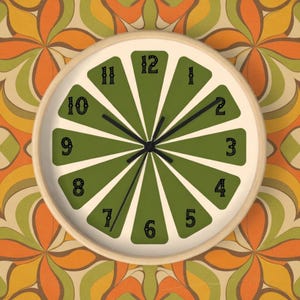 May include: A round wall clock with a light wood frame. The clock face features green, wedge-shaped segments with black numerals. The hands are black. The background is a retro floral pattern in orange, green, and cream.