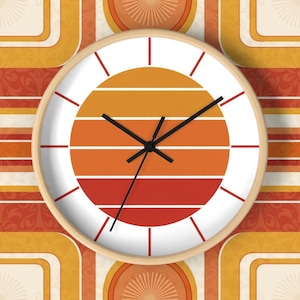 May include: A round wall clock with a retro design. The clock face features a sunset design with horizontal stripes in shades of orange and red. The clock has a light wood frame and black clock hands. The background has a repeating pattern of orange and yellow shapes.