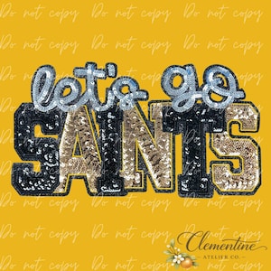 May include: A sequined patch design on a yellow background featuring the text let's go in silver sequins above the word SAINTS in alternating black and gold sequins. The letters have a bold block font style with a distinct outline and texture.