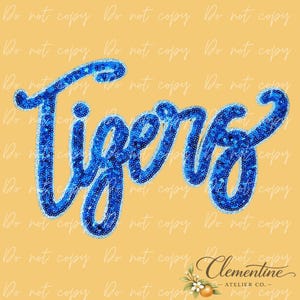 May include: The word "Tigers" in a cursive font, rendered in blue sequins, is displayed on a yellow background. The design includes the text "Do not copy" repeated across the image.