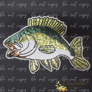 May include: A fish-shaped patch covered in shimmering sequins. The design features a mix of lime green, dark forest green, and white sequins, with a silver-toned border outlining the fins, tail, and body. The fish is depicted in profile.