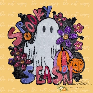 May include: An embroidered patch featuring a white ghost centered among colorful flowers and two pumpkins. The text SPOOKY SEASON is stitched in pink, blue, and purple letters around the ghost. The design includes sequins and black fabric.