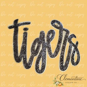 May include: The word "Tigers" in a script font, with a black and silver sequin design, is displayed on a yellow background. The image also includes the text "Clementine ATELIER CO." in a script font.