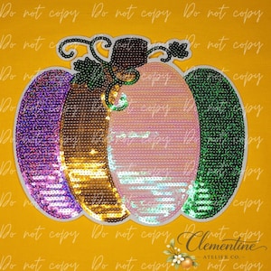 May include: A pumpkin-shaped patch covered in multi-coloured sequins. The pumpkin features vertical segments in purple, gold, iridescent pink, and green. A dark brown stem and green vine details are at the top, all outlined in a white border.