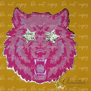 May include: A pink and light pink wolf head patch with a glittery texture. The wolf has an open mouth showing white teeth and is wearing two large, silver glittery star-shaped glasses over its eyes. The patch has a silver glittery border.