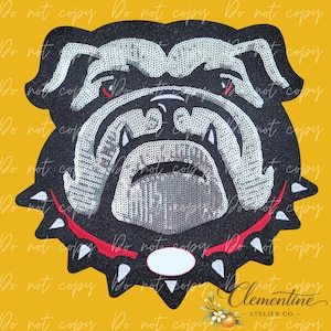 May include: A sequined bulldog patch featuring a black and silver color scheme with a red collar adorned with silver spikes. The design displays the head of a bulldog with detailed facial features, including white and silver sequins.
